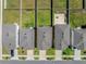 Rooftop aerial view of neighborhood homes, showcasing roof conditions, yards, and street layout at 7580 Freesia Trce, Wesley Chapel, FL 33545