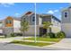 Charming two story home with a manicured lawn and a two car garage at 7580 Freesia Trce, Wesley Chapel, FL 33545