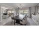Bright dining room with ample natural light, modern decor, and an open layout at 7922 Spring Valley Dr, Tampa, FL 33615