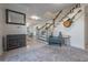Welcoming foyer featuring a staircase, stylish furnishings, and elegant decor at 7922 Spring Valley Dr, Tampa, FL 33615