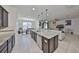 Stylish kitchen island open to the living room, great for entertaining and Gathering gatherings at 8306 Red Spruce Ave, Riverview, FL 33578