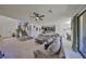 Spacious living room with tile floors, comfortable seating, and open layout connecting to the kitchen and dining area at 8306 Red Spruce Ave, Riverview, FL 33578