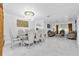 Formal dining room featuring ornate furniture, bright lighting, and marble floors at 9320 Merlot Cir, Seffner, FL 33584