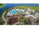 Aerial view of the community pool, playground, and pavilion, highlighting Gathering-friendly amenities at 10072 Sage Creek Dr, Ruskin, FL 33573