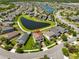 Overhead view showing property's placement within a neighborhood with lakes and cul-de-sacs at 10072 Sage Creek Dr, Ruskin, FL 33573