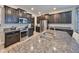 Well-equipped kitchen with granite countertops and stainless steel appliances at 10072 Sage Creek Dr, Ruskin, FL 33573