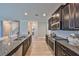 Spacious kitchen featuring stainless steel appliances and granite countertops at 10072 Sage Creek Dr, Ruskin, FL 33573