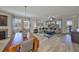 Open-concept living space seamlessly connecting the dining and living areas at 10072 Sage Creek Dr, Ruskin, FL 33573