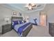 Lovely main bedroom featuring trey ceilings, carpeting, and stairs leading to a different level at 10072 Sage Creek Dr, Ruskin, FL 33573