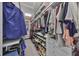 Organized walk-in closet offers ample storage space with shelving and hanging racks at 10072 Sage Creek Dr, Ruskin, FL 33573