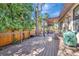 Inviting back deck with wooden seating and beautiful backyard views is ideal for entertaining at 1108 W Charter St, Tampa, FL 33602