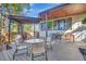 Spacious backyard patio offers multiple seating areas for relaxation and gatherings at 1108 W Charter St, Tampa, FL 33602