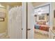 Bathroom and bedroom as viewed through a doorway. Shows shower and neutral colors at 1108 W Charter St, Tampa, FL 33602