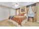 Comfortable bedroom featuring neutral tones, stylish curtains, and plush bedding at 1108 W Charter St, Tampa, FL 33602