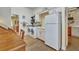This convenient laundry room has custom cabinets, counter space, and a washer and dryer at 1108 W Charter St, Tampa, FL 33602