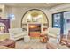 A cozy living room has a fireplace, a large television, and niches for storage at 1108 W Charter St, Tampa, FL 33602