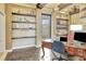 Elegant home office with floating shelves, a large desk, and charming decor, creating a bright and stylish workspace at 1108 W Charter St, Tampa, FL 33602