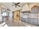 Outdoor patio with grill, cabinets, countertops and dining table at 1108 W Charter St, Tampa, FL 33602