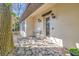 Charming stone patio with bistro set, offering a tranquil outdoor retreat at 1108 W Charter St, Tampa, FL 33602