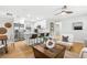Modern kitchen and dining area featuring stainless steel appliances and a breakfast bar at 1600 Connecticut Ne Ave, St Petersburg, FL 33703