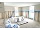Spacious living room featuring large windows for natural light with visible studs, ready for renovation at 1600 Connecticut Ne Ave, St Petersburg, FL 33703