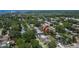 Charming neighborhood featuring a lovely home surrounded by lush greenery, convenient street parking, and proximity to the coast at 1623 San Mateo Dr, Dunedin, FL 34698