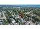 Aerial view highlighting the property's backyard pool and neighborhood at 1623 San Mateo Dr, Dunedin, FL 34698