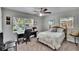 Cozy bedroom with desk and ample natural light at 1623 San Mateo Dr, Dunedin, FL 34698