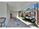 Spacious carport featuring a golf cart, providing convenient parking and storage at 1623 San Mateo Dr, Dunedin, FL 34698