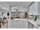 Modern open kitchen overlooking the living area at 1623 San Mateo Dr, Dunedin, FL 34698