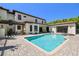 A large backyard pool and spa with brick surround and views of the beautiful, landscaped backyard at 17003 Madres De Avila, Tampa, FL 33613