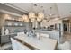 Open-concept dining area features a sleek table and direct access to the gourmet kitchen at 1720 Mariner Way, Tarpon Springs, FL 34689