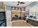 Office with custom built-ins, a large window, plush rug, ample workspace, and contemporary design elements at 1720 Mariner Way, Tarpon Springs, FL 34689