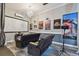 Home theater featuring reclining leather seats, large screen, and movie-themed decor at 1720 Mariner Way, Tarpon Springs, FL 34689