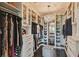 This dreamy walk-in closet is complete with custom shelving and mirrored display cases at 1720 Mariner Way, Tarpon Springs, FL 34689