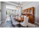 Dining room with wood table and chairs, chandelier, and built-in wood china cabinet at 17927 Bahama Isle Cir, Tampa, FL 33647