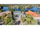 Beautiful waterfront home featuring lush landscaping and a spacious three car garage at 17927 Bahama Isle Cir, Tampa, FL 33647