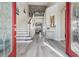 Welcoming foyer with soaring ceilings, staircase, and views of the living area at 17927 Bahama Isle Cir, Tampa, FL 33647
