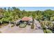 Gated community entrance with lush landscaping and a fountain at 17927 Bahama Isle Cir, Tampa, FL 33647