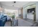 Upstairs loft area featuring comfortable seating and a bright open space at 17927 Bahama Isle Cir, Tampa, FL 33647