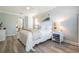 Inviting main bedroom offering a serene atmosphere and an attached bath at 17927 Bahama Isle Cir, Tampa, FL 33647