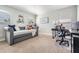 Comfortable office with a sofa, desk and decor at 17927 Bahama Isle Cir, Tampa, FL 33647