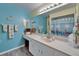 Bright bathroom with an extended vanity and lots of storage at 1929 New Bedford Dr, Sun City Center, FL 33573