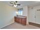 Dining area with dark wood cabinetry and natural light at 1929 New Bedford Dr, Sun City Center, FL 33573