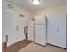 Laundry area featuring a folding area and additional cabinetry for storage at 1929 New Bedford Dr, Sun City Center, FL 33573
