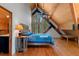 Bedroom with vaulted wood ceilings, large windows, and a bed with blue patterned bedding at 20926 Ragan Ln, Land O Lakes, FL 34638