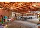 Spacious detached garage with unfinished ceilings, concrete floor, and lots of room for parking or a workshop at 20926 Ragan Ln, Land O Lakes, FL 34638