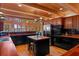 Kitchen featuring wood countertops, wooden cabinets, stainless steel appliances, and lake views at 20926 Ragan Ln, Land O Lakes, FL 34638