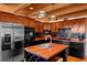 Kitchen with wooden cabinets, a center island, stainless steel appliances, and pendant lighting at 20926 Ragan Ln, Land O Lakes, FL 34638