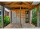 Interior view of backyard shed with partial bathroom. Perfect for changing after swimming at 20926 Ragan Ln, Land O Lakes, FL 34638